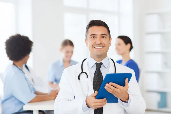 depositphotos_74106569-stock-photo-happy-doctor-with-tablet-pc